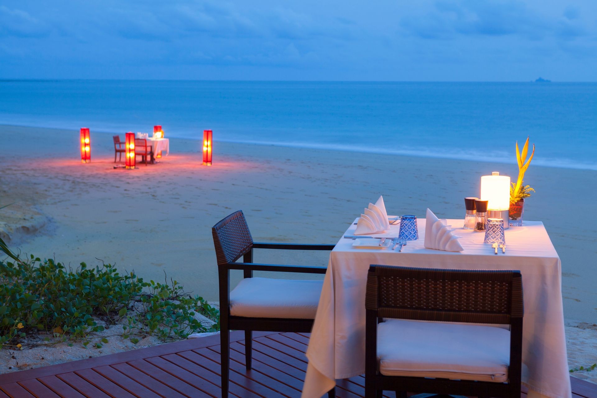 Table setting. Resort cafe on the tropical sea beach with beautiful view.